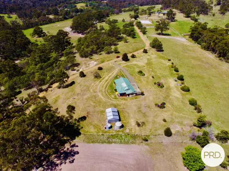 Rural acreage lifestyle with endless potential just minutes to sand and surf - Just Add You!