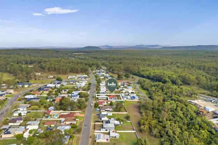 Buy 3 Bedroom Home in Cessnock with Generous Battle-Axe Block