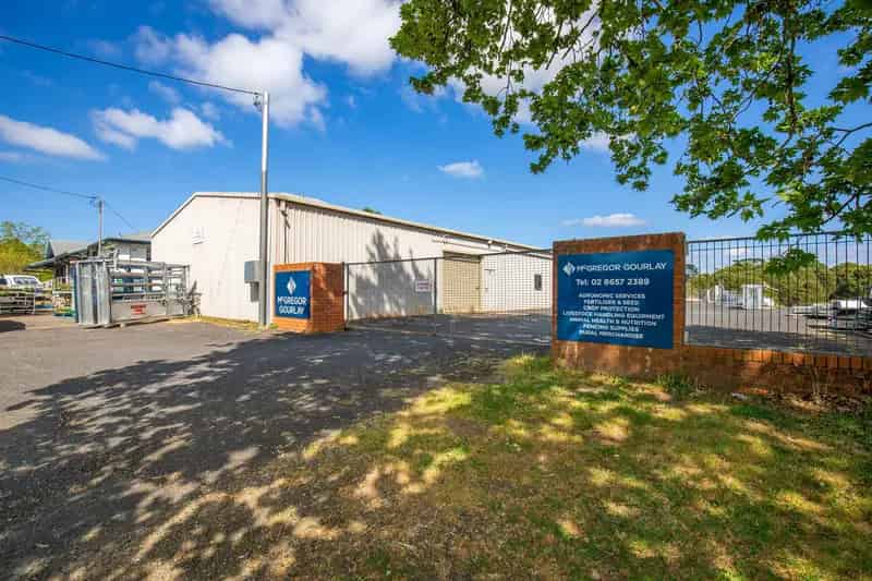A solid investment of storage spaces with residential building entitlement on an acre block in town