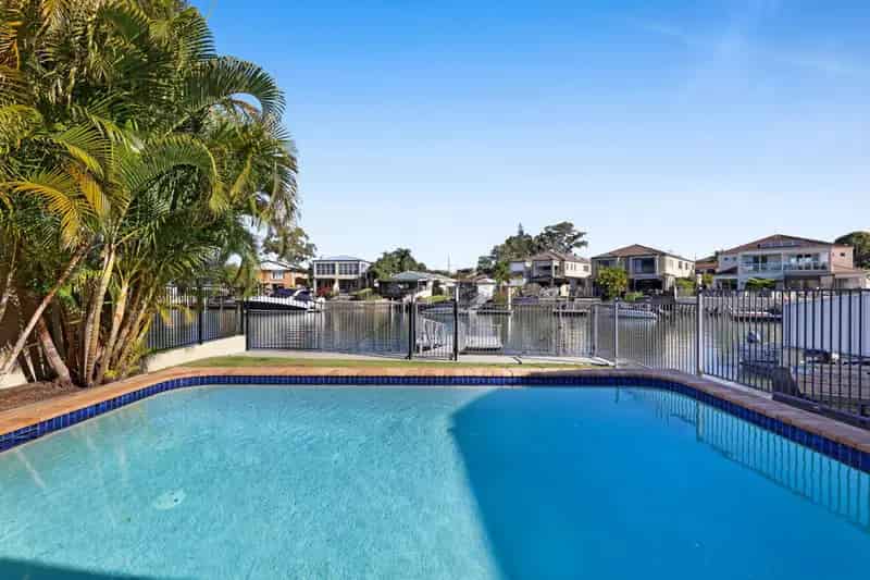 Rent Waterfront Home with Boating Amenities in Biggera Waters QLD