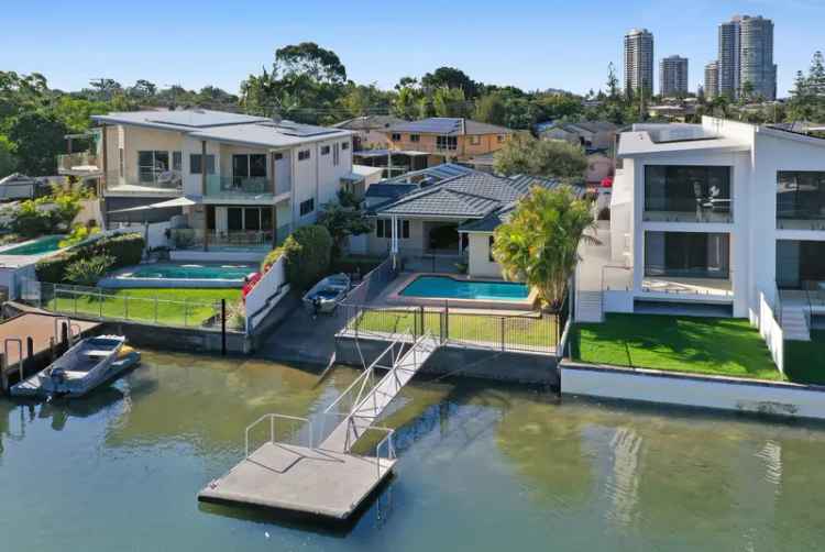 Rent Waterfront Home with Boating Amenities in Biggera Waters QLD