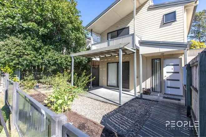 Spacious 2-Level Townhouse with Private Courtyard and Oversized Garage