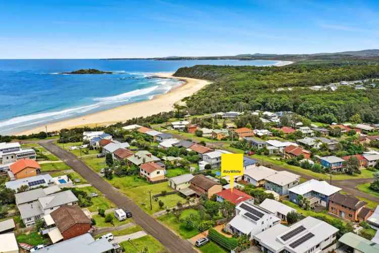 Buy house near Manyana Beach with stunning views and modern design