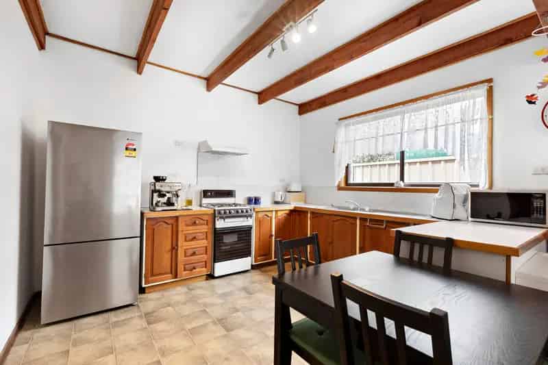 Buy house in convenient location with dual living options