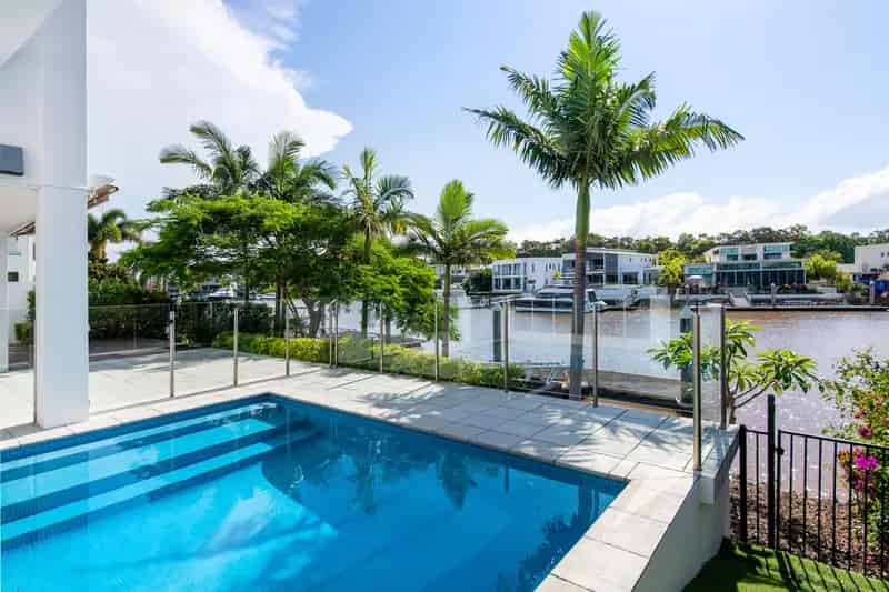 Buy Contemporary House in Sanctuary Cove with Waterfront Views and Luxury Features