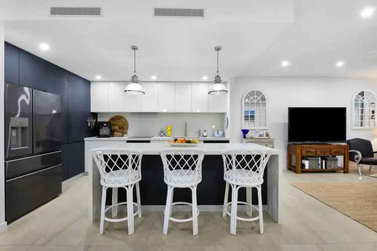 Buy Duplex in Biggera Waters - Modern Four Bedroom Home Near the Broadwater