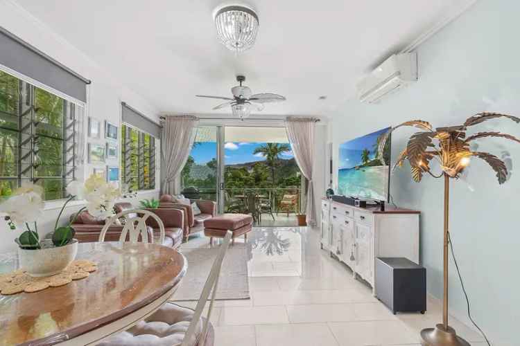 Step Into Paradise: Airlie Beach Chic - Fully Renovated, Ocean & Rainforest Views, Turnkey Investment with LuxeFurnishings!