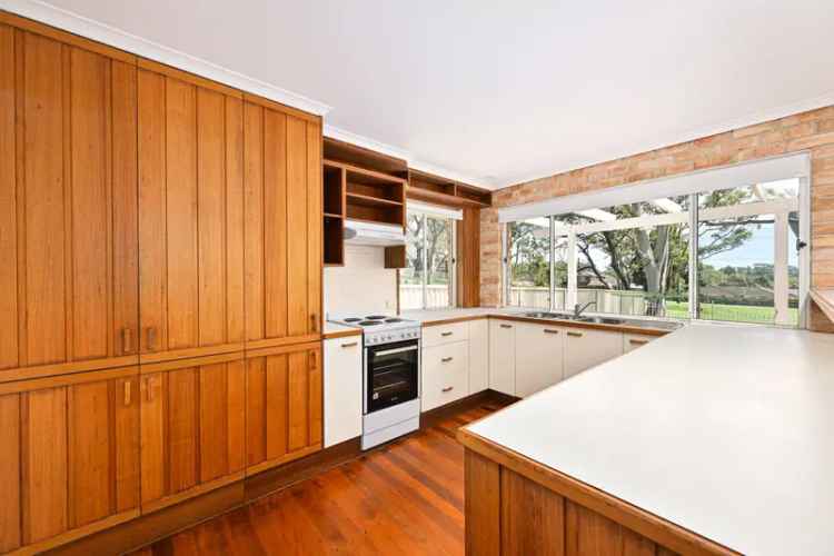 Lease Home in Port Macquarie with Modern Updates and Tranquil Surroundings