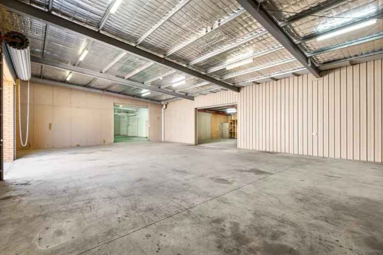 Rent industrial property large shed Melbourne Highway with multiple workspaces