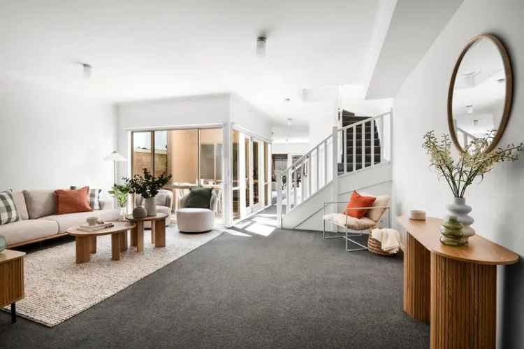 Light Filled Townhouse Near Smith Street with 4 Bedrooms and Courtyard