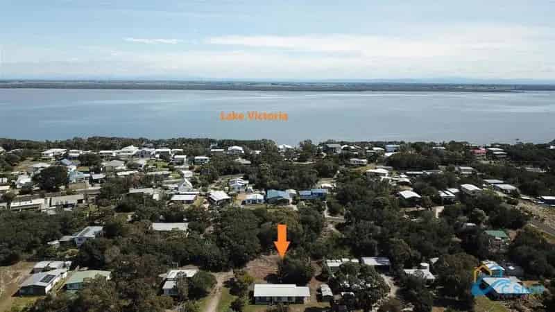 Buy Beach Block in Quiet Street with Power Connected Near Lake Victoria