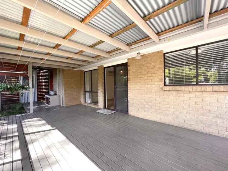 Neat Two Bedroom Townhouse with Entertainers Deck