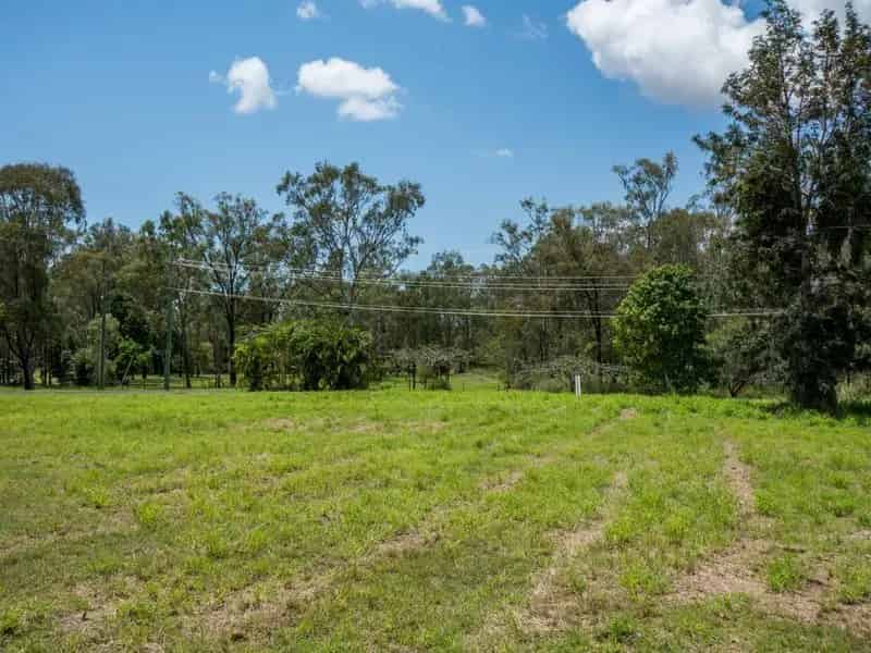 HALF ACRE OVERLOOKING RIVER ON BOCKS ROAD! CLOSE TO TOWN & SCHOOLS