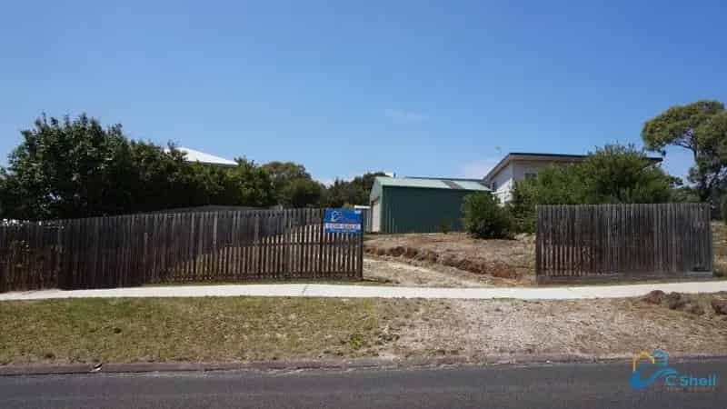 buy land with garage and water views in prime coastal location