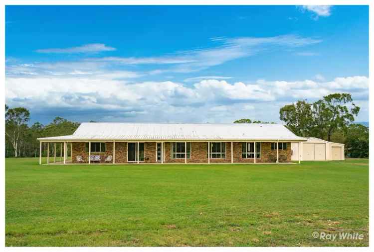 Spacious Family Home on 2.3 Hectares with Endless Potential