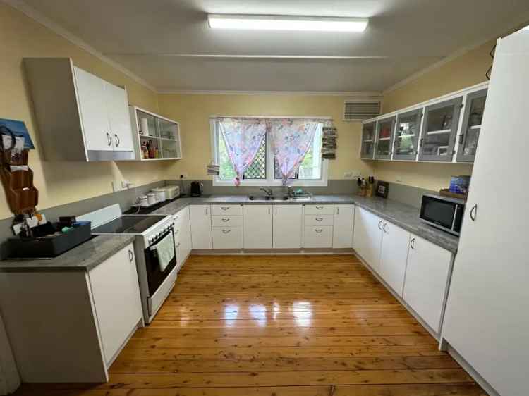 Buy Queenslander Home in Prime Location with Spacious Layout