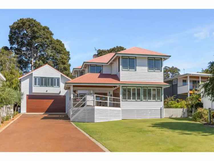 Luxury Beachfront Home with Ocean Views and Boat House