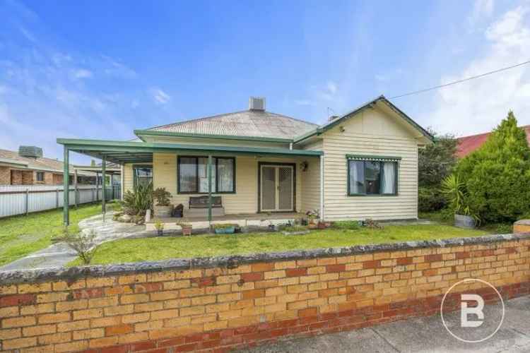 Charming Weatherboard Home with Rear Lane Access and Renovation Potential