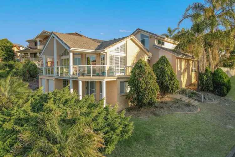 Luxury 5-Bedroom Home with Ocean Views Caves Beach NSW