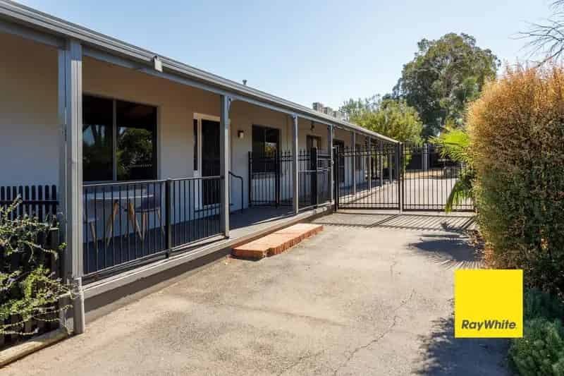 3-Bedroom Home with Modern 2-Bedroom Unit & Solar-Heated Pool - Dual Income Gem!