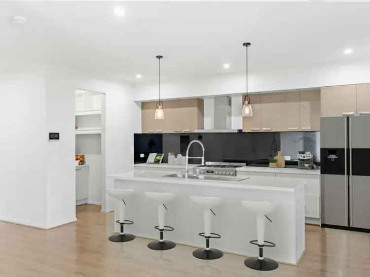 Contemporary East-Facing Henley built Double-Storey Home, Directly Opposite Wyndham Vale Primary!