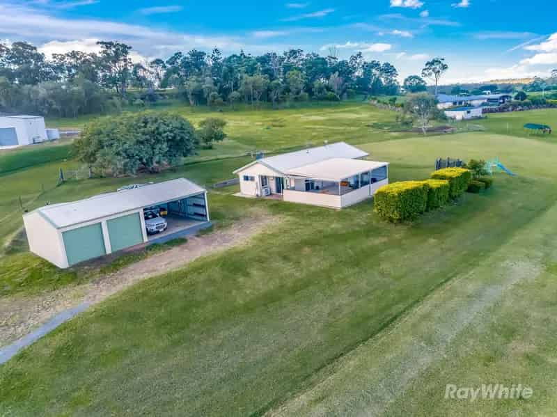 "Country Charm & Comfort on Just Under 4 Acres"
