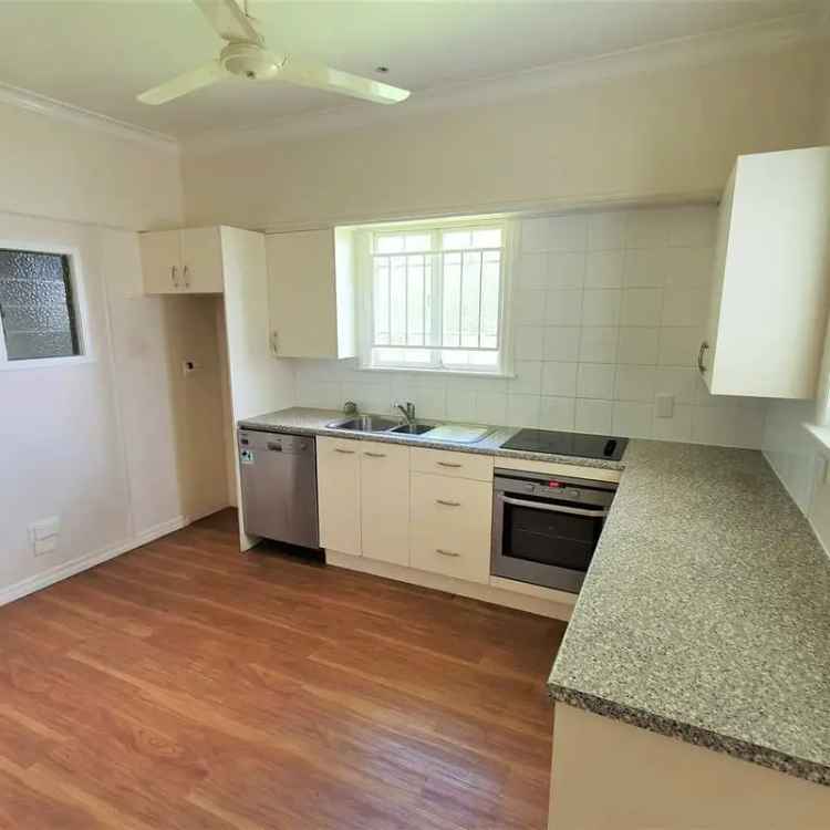 Buy family home in ideal location with large yard and air conditioning