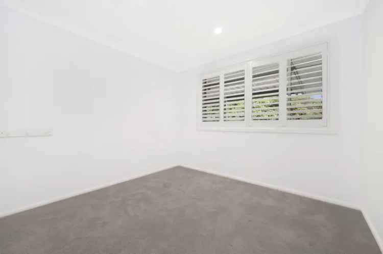 Renovated house for sale in Sydney with three bedrooms and heritage facade