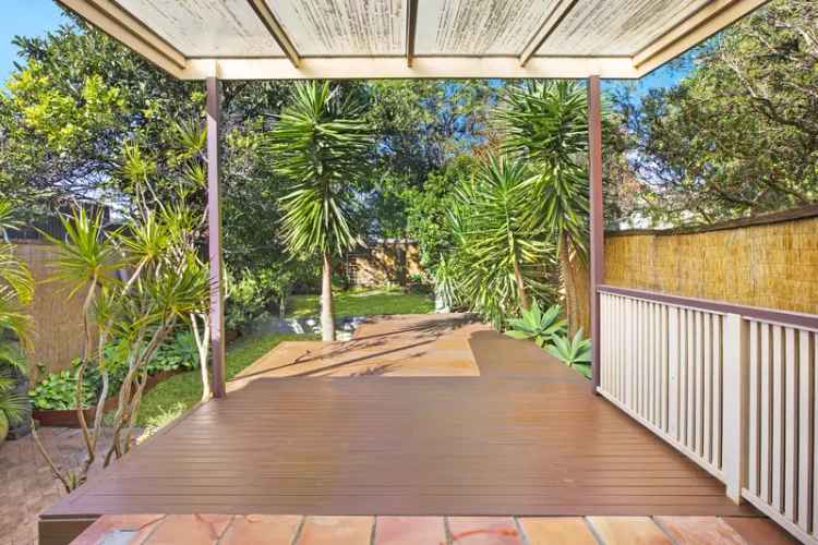 Sunbathed Family Home with Zen Garden and Ample Parking