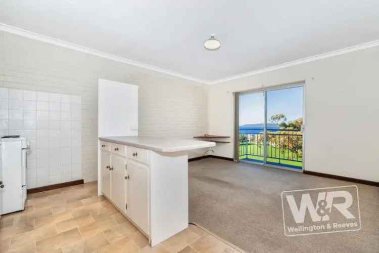 CORNER WATER VIEW CBD UNIT UP FOR GRABS