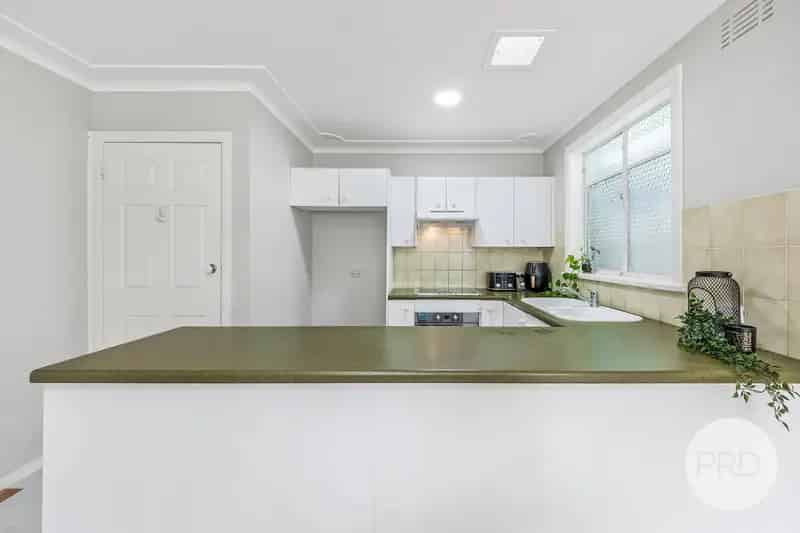 Dual-Income Opportunity in a Prime Campbelltown Location - Live In or Invest with Confidence