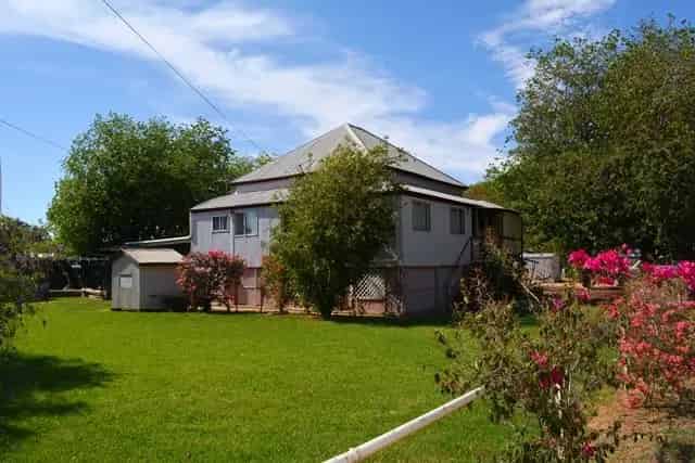 Charming High-Set Queenslander in Prime Location