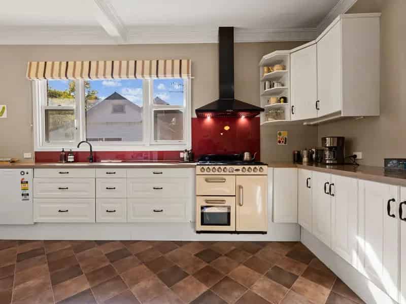 Charming 1950s Brick Home with Potential Self-Contained Studio in Prime Location