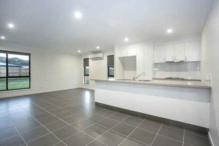 Spacious 4-Bedroom Family Home with Pool - 64 Macarthur Drive, Cannonvale, QLD 4802