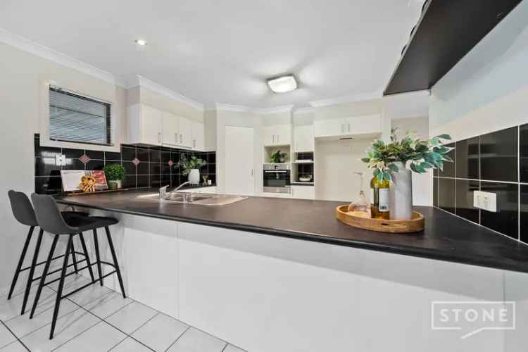 Buy house in Redland Bay with flexible layout and spacious living areas