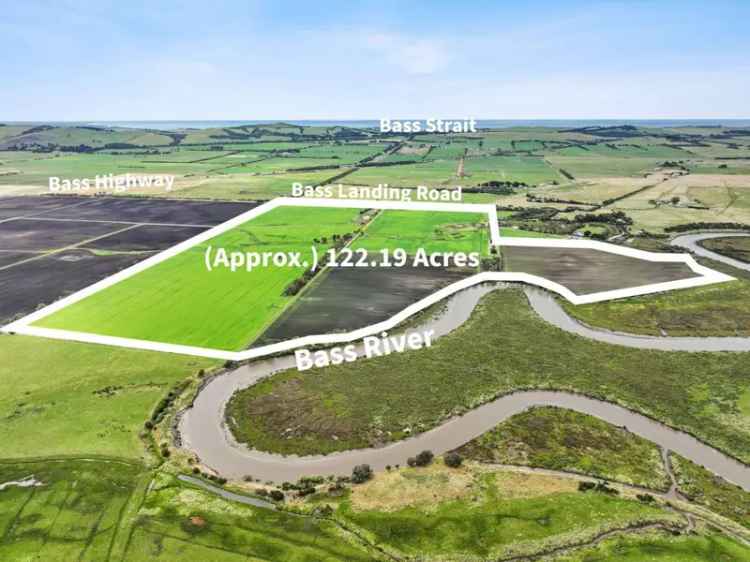 Buy Rural Property with River Frontage in Bass Featuring Home and Sheds