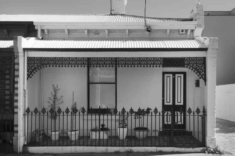 Buy Victorian terrace in South Melbourne with courtyard and potential