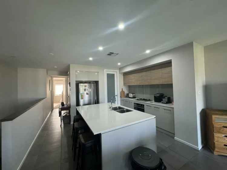 Rent a Modern Home in Oran Park with Stunning Kitchen and Double Garage