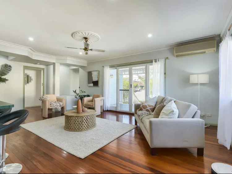 Buy family home in Wavell Heights with spacious layout and multiple features