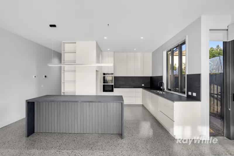 Brand New 4-Bedroom Townhouse in Coveted McKinnon School Zone