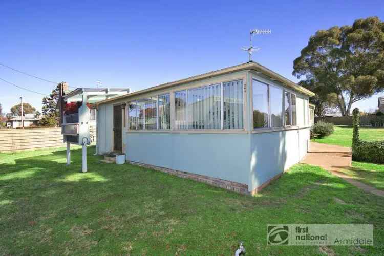 Buy cottage in Armidale with potential on large block