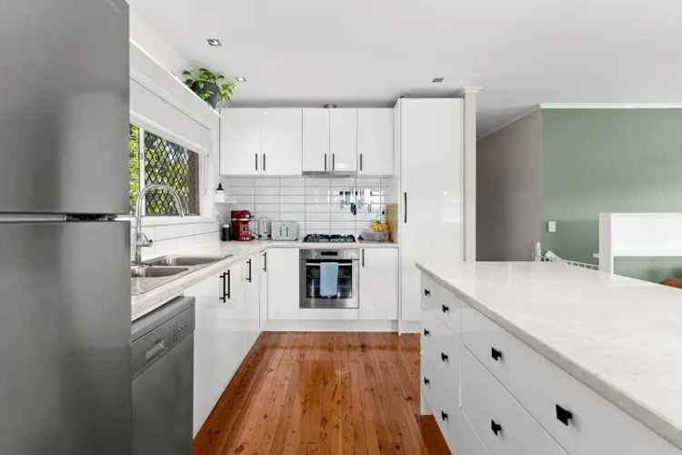 Stylish Family Home with Versatile Living Spaces in Mount Gravatt East