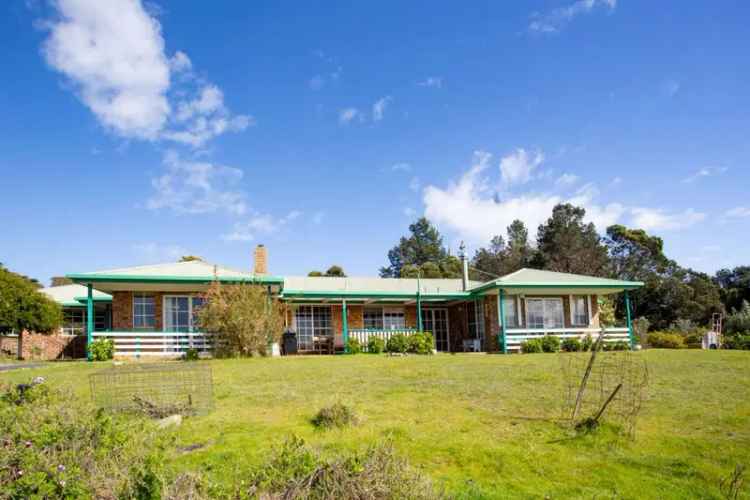 Buy rural property with stunning water views in Tasmania