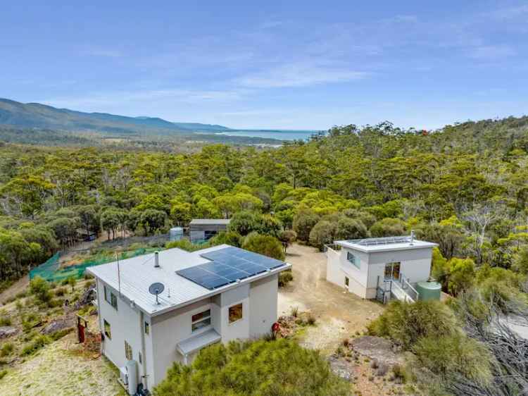 Tasmania Eco-Friendly Off-Grid Home with Stunning River Views