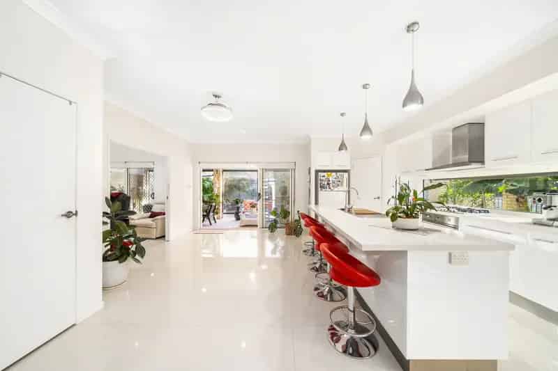 Rare Beachfront Elegance with Dual Living Potential