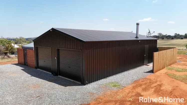 Buy Elevated Residential Block in Grenfell with Yard and Shed Features