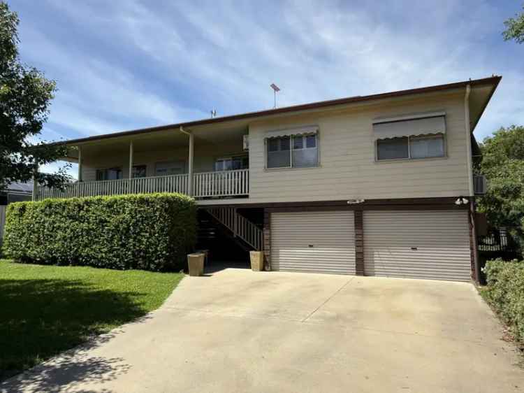 HUGE FAMILY HOME IN WARATAH STREET