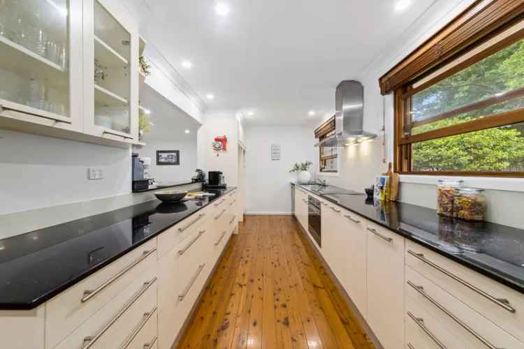 Buy Family Home in Waitara with Versatile Living Spaces and Garden