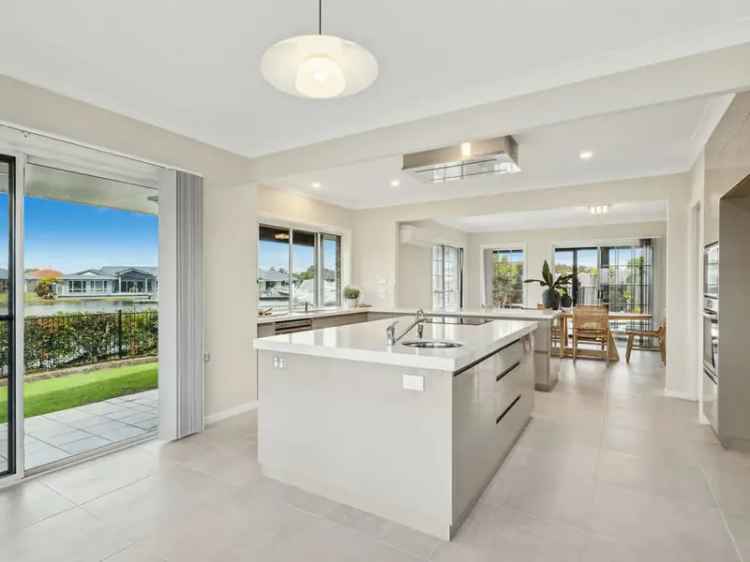 Buy luxury house in Ballina Quays with waterfront views and pool