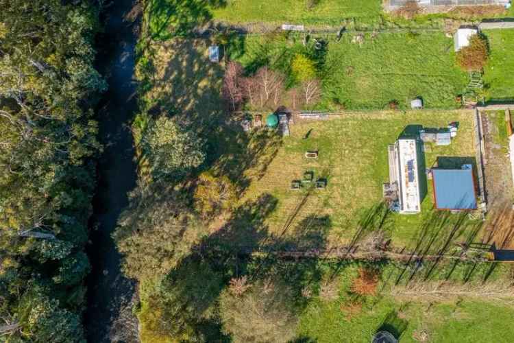 Riverside Gem: A 1369 sqm Allotment Along Kermandie River